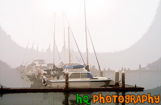 Row of Sailboats in Fog painting