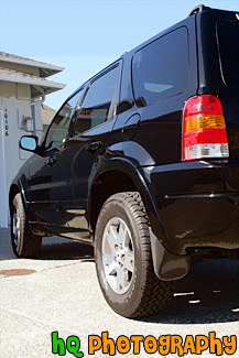 Black Sports Utility Vehicle painting