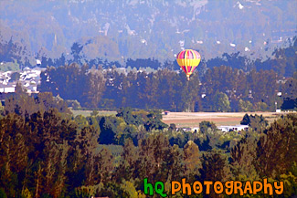 Hot Air Balloon Over Country Land painting