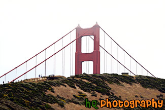 Tip of Golden Gate Bridge Behind Hill painting