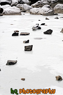 Frozen Rocks on Icy Water painting