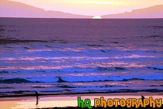 Sun Setting Behind Pacific Ocean painting