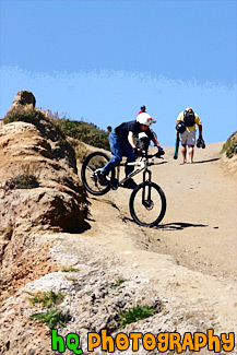 Kid Riding Bike Down a Hill painting