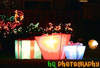 Lit Up Christmas Presents in Yard painting