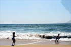 Kids Running Away from Ocean Waves digital painting