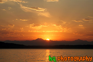 Orange Sunset Behind Olympic Mountains