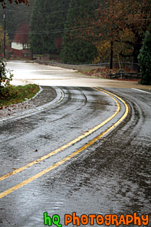 River Flooding Over Road