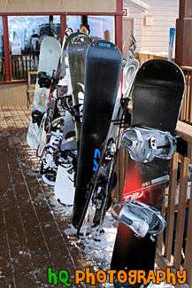 Row of Snowboards & Skis