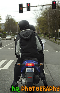 Two People on a Motor Bike