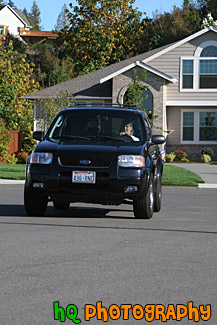 SUV Driving on Road