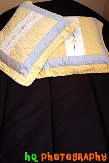 Yellow Pillows on Bed
