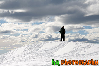 Man Looking Over Ledge