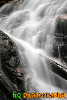 Watefall Close Up Over Log