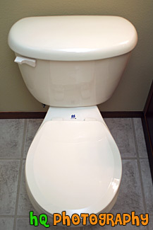 White Toilet With Seat Down
