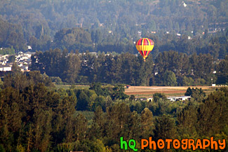 Hot Air Balloon Over Country Land