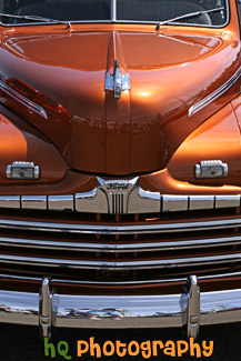 Front of Old Orange Ford Truck Super Deluxe