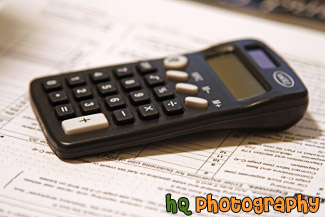 Black Calculator on Tax Forms