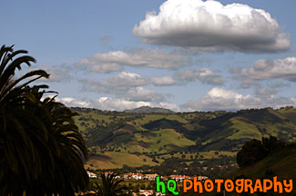 Green Hills & Partly Cloudy Sky