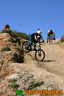 Kid Riding Bike Down a Hill