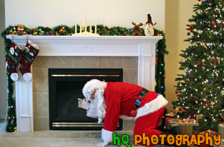 Santa by Fireplace