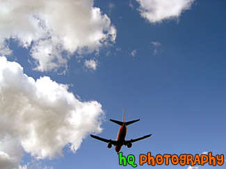 Airplane Overhead in Sky