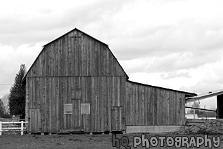 Brown Barn & Clouds black and white picture