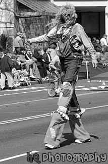 Tall Clown on Stilts black and white picture