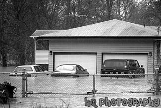 Cars Flooded in River black and white picture