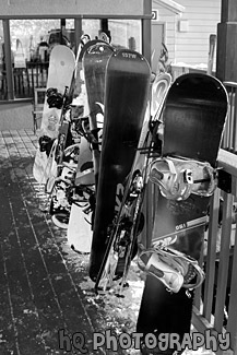 Row of Snowboards & Skis black and white picture