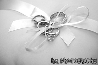 Wedding Rings Tied on Pillow black and white picture