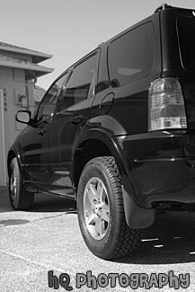 Black Sports Utility Vehicle black and white picture