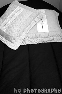 Yellow Pillows on Bed black and white picture