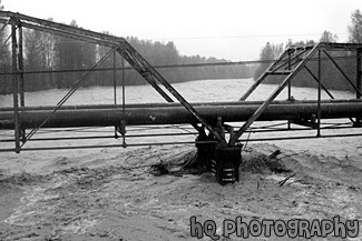 Flooded River Under Bridge black and white picture