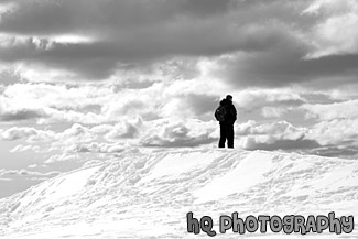 Man Looking Over Ledge black and white picture