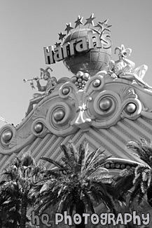 Harrah's Hotel Sign in Daytime black and white picture