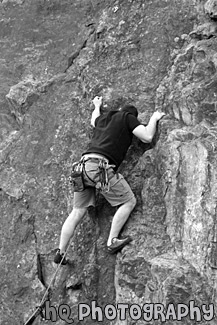 Person Rock Climbing black and white picture