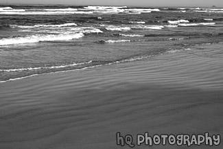 Ocean Waves Along Beach black and white picture