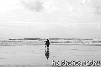 Kid with Bucket on Beach black and white picture