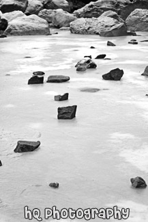 Frozen Rocks on Icy Water black and white picture