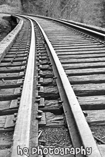 Railroad Tracks Curve black and white picture