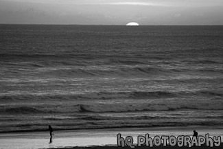 Sun Setting Behind Pacific Ocean black and white picture