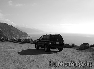 Ford Escape on Dirt Road Ocean View black and white picture