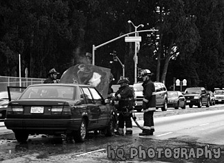 Firefighters & Car Fire black and white picture