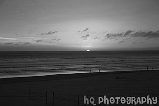 Sun Setting Behind Ocean black and white picture