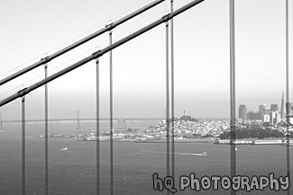 Bay Bridge seen through Golden Gate Bridge black and white picture