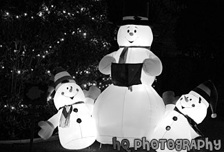 Blow-up Snowmen at Night black and white picture