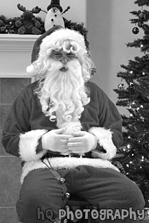 Close Up of Santa Sitting in Chair black and white picture