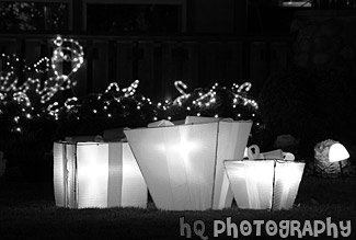 Lit Up Christmas Presents in Yard black and white picture