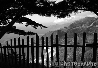 Pacific Ocean View Through Fence black and white picture