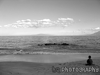 Kid Playing in Sand black and white picture